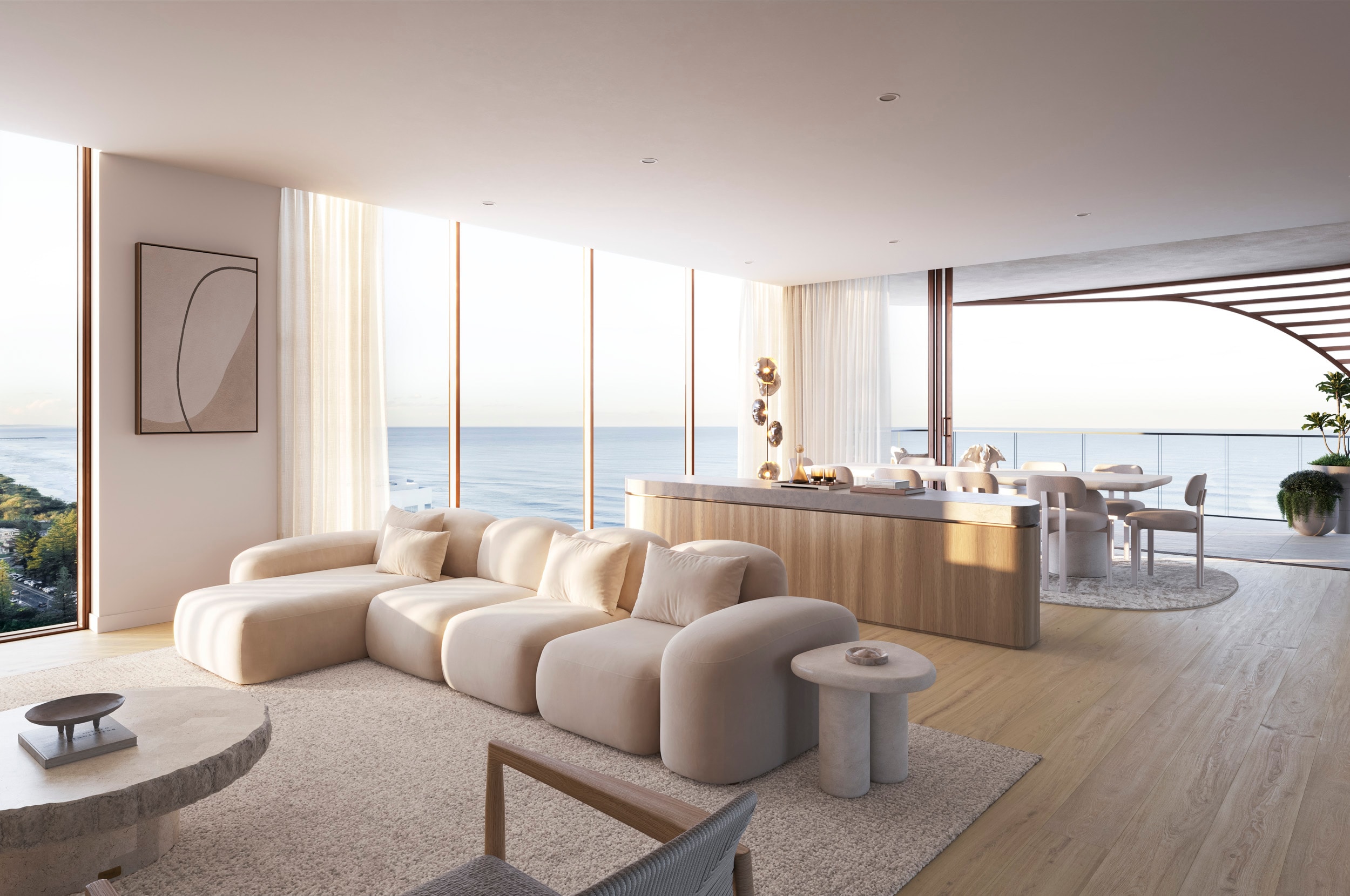 Bella Vie living room with the sea rolling beyond floor-to-ceiling glass